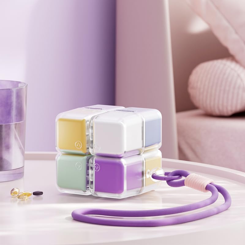 Magnetic pill organizer cube placed on bedside table