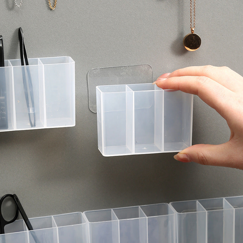 Clear compartments of Magic Mount Wall Storage Box